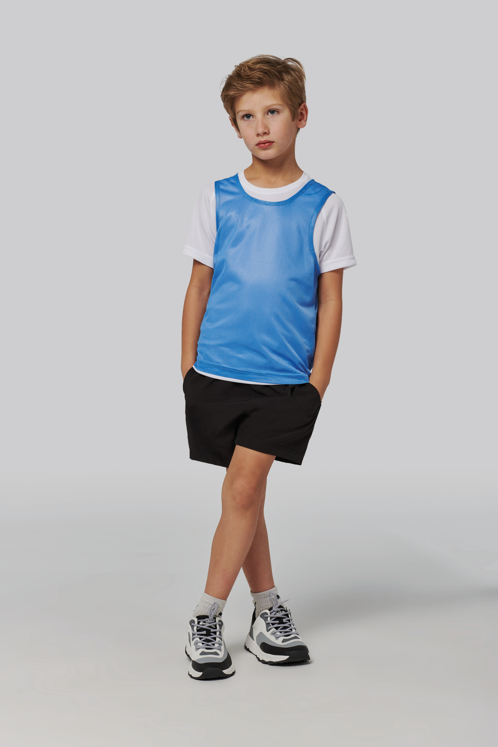 Peto ligero de rejilla multi deportes para ni os